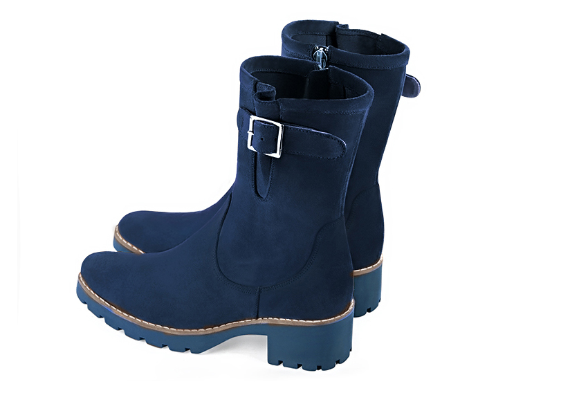 Navy blue women's ankle boots with buckles on the sides. Round toe. Low rubber soles. Rear view - Florence KOOIJMAN